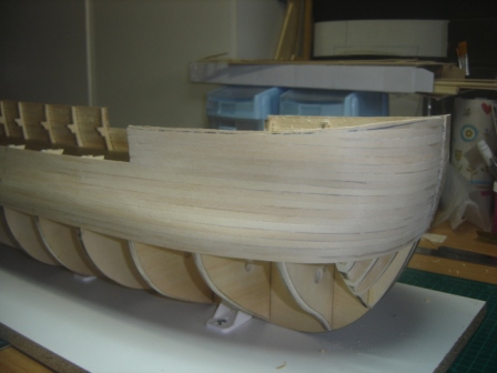 03-45 First pass sanding starboard front small.JPG