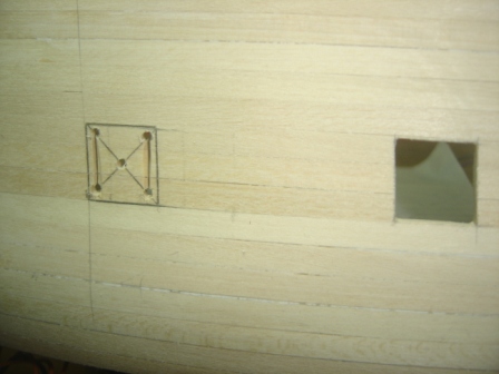 05-25 Cutting a gun port small.JPG