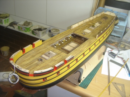 Upper deck planking complete & bow gun ports small.JPG