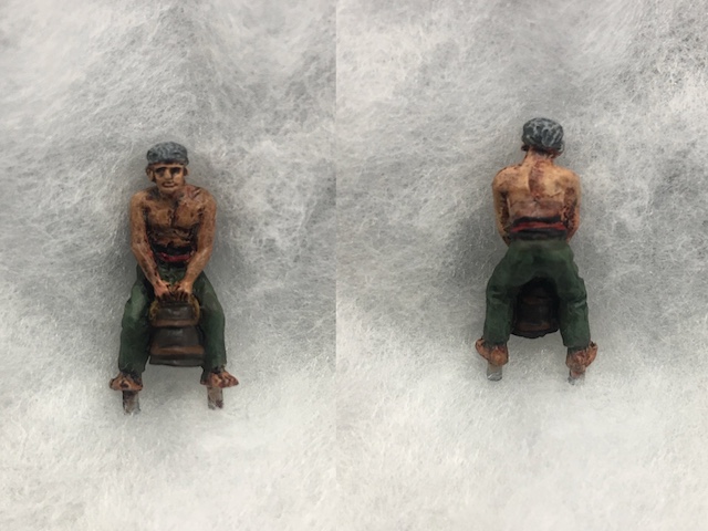 Crouching crewman with barrel copy.jpg