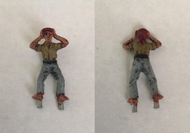 Crouching crewman covering ears copy.jpg