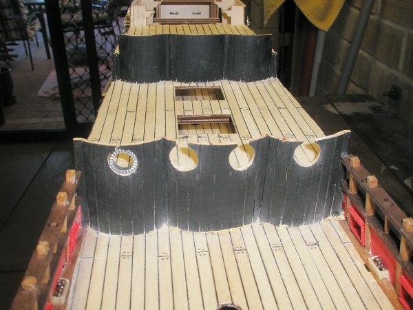 143. cutting round holes for gun ports.JPG